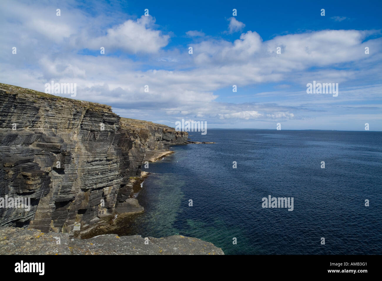 dh Clu Ber DEERNESS ORKNEY East coast seacliffs calm blue sea and sky rugged coastline summer Stock Photo
