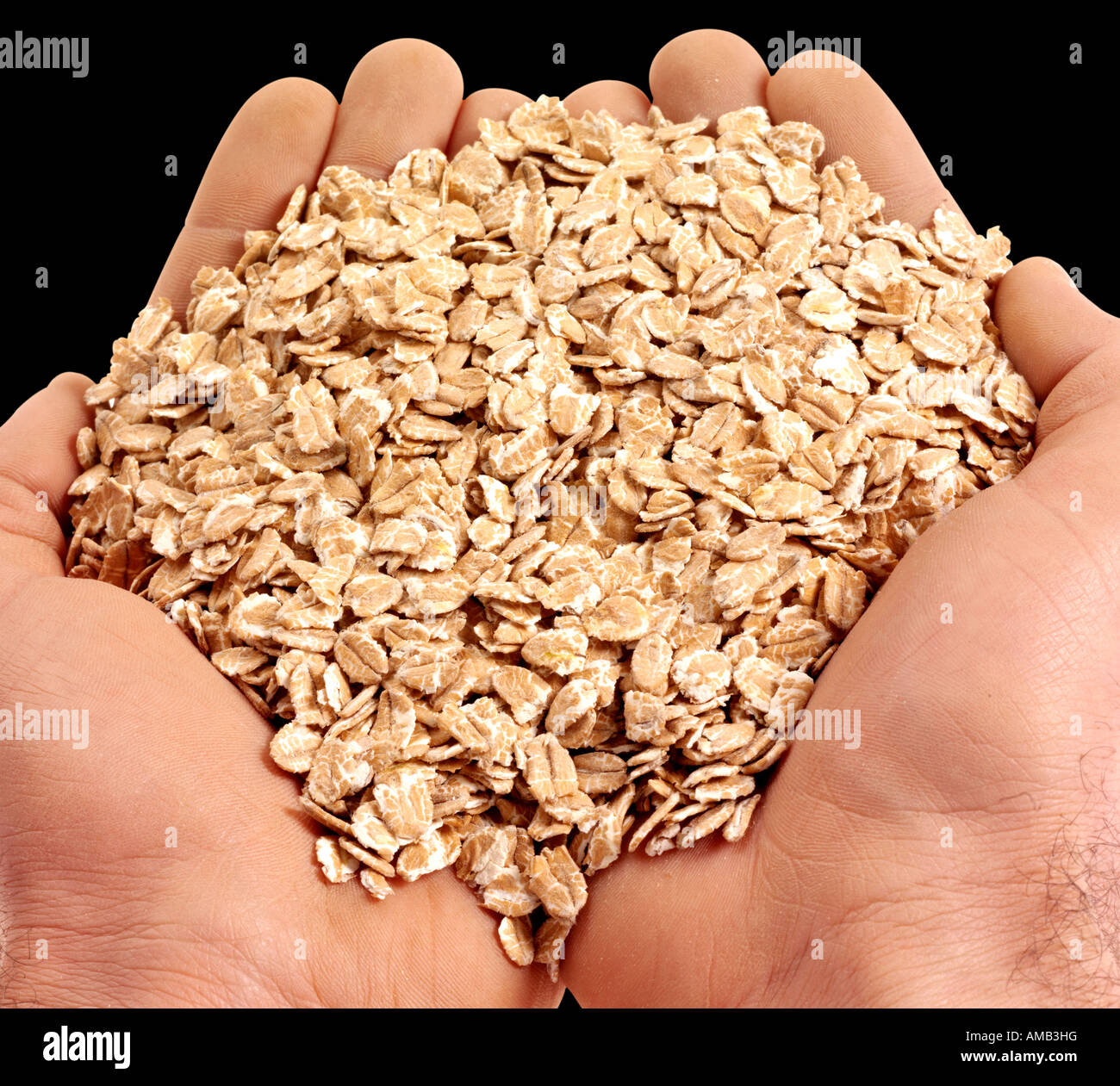 HANDFUL OF SPELT FLAKES Stock Photo Alamy
