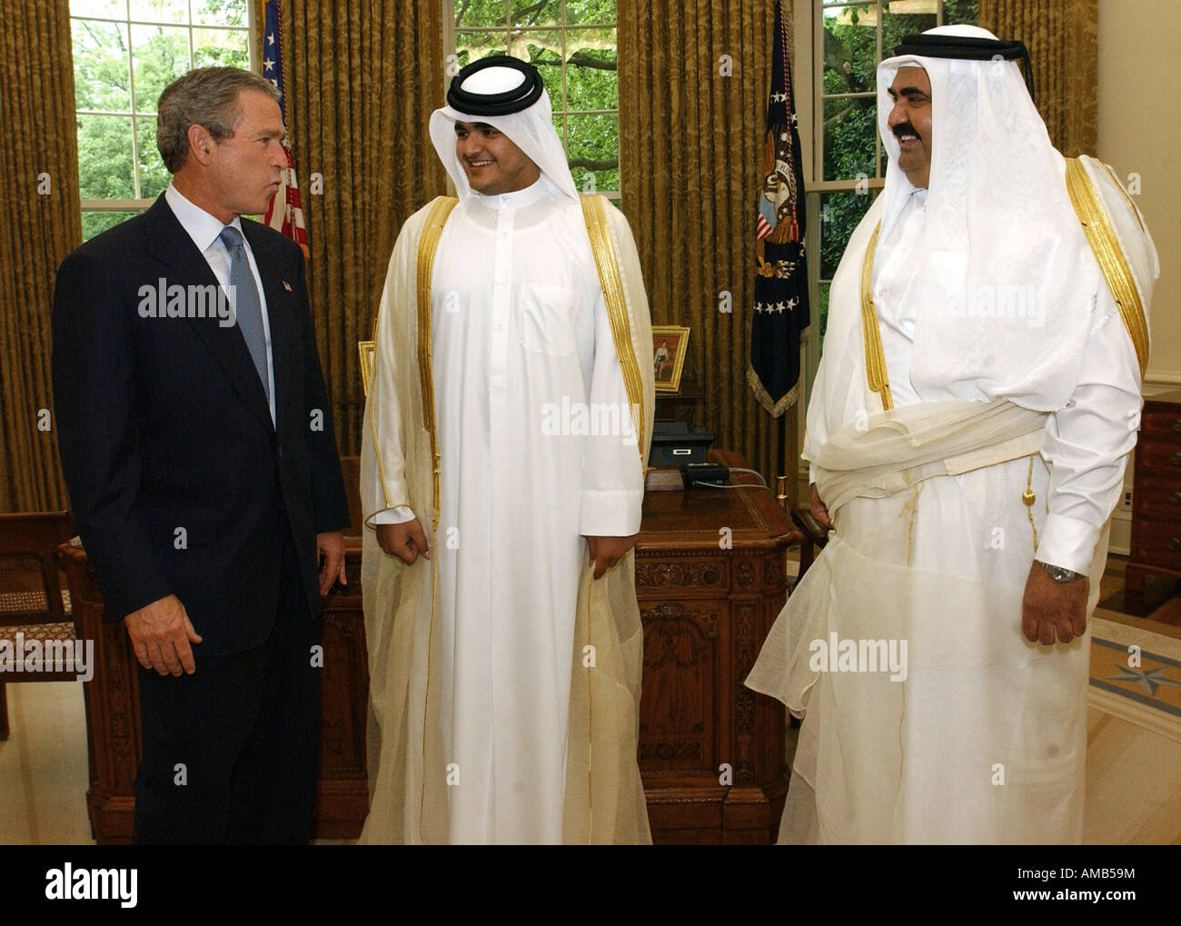 Sheikh Hamad Bin Khalifa Al Thani Emir of Qatar and son Sheikh Joaan Bin Hamad Al Ihani meet with President Bush White Ho Stock Photo