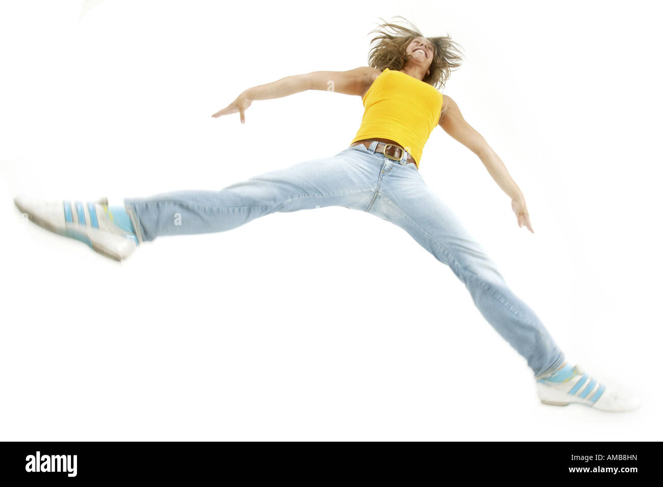 young woman jumping in the air Stock Photo