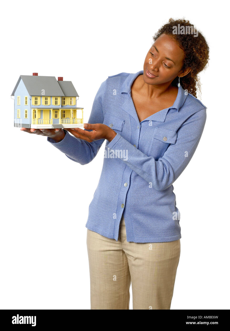 Woman holding model house Stock Photo