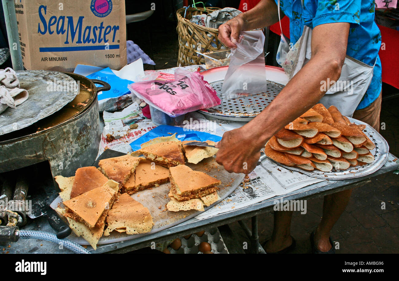 Malaysian Abong pancakes being made at a street hawkers stall, Malaysia Stock Photo