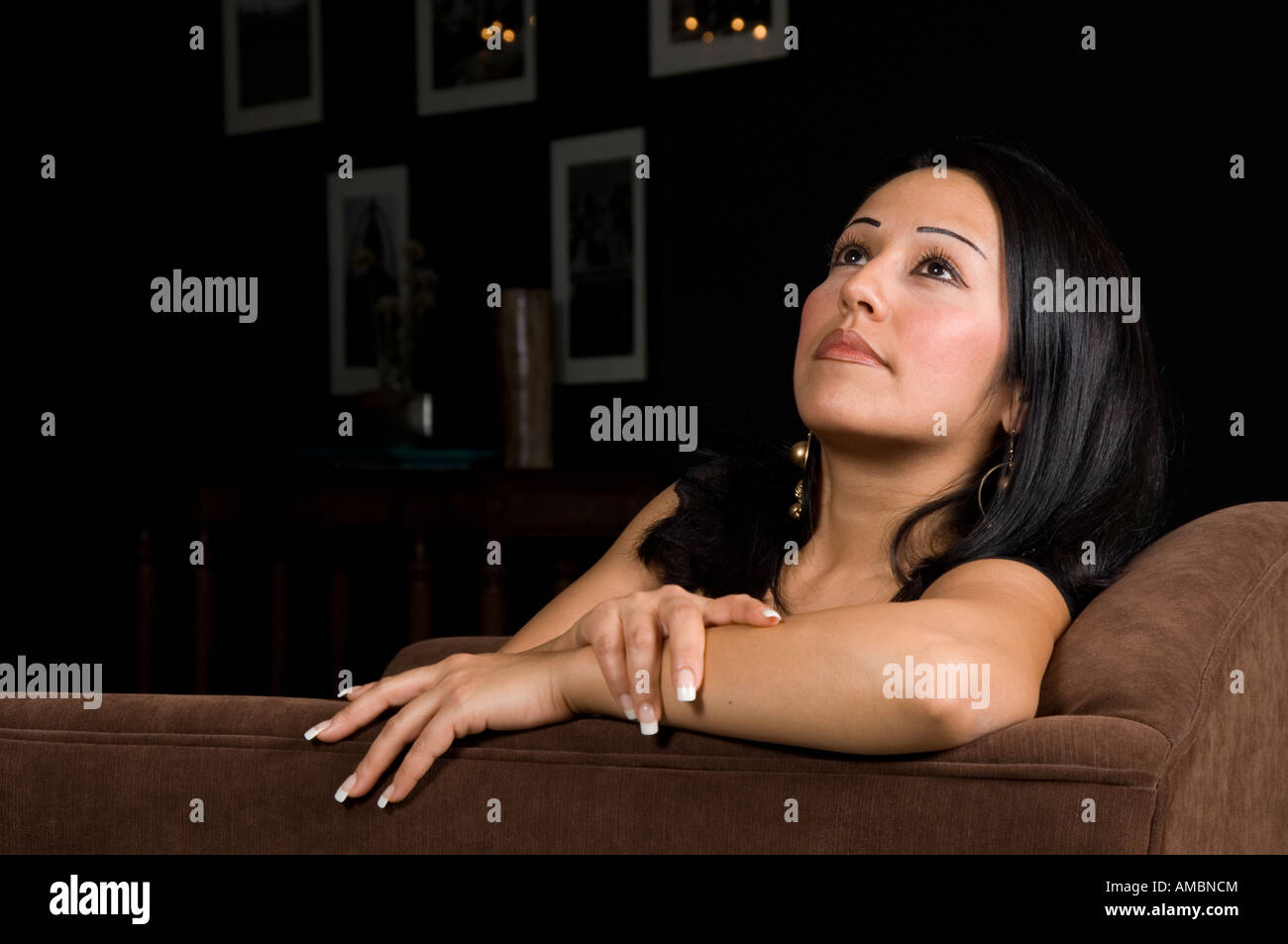 Mature Woman Sitting Looking Up Stock Image Mature Woman Sitting Looking Up Stock Image