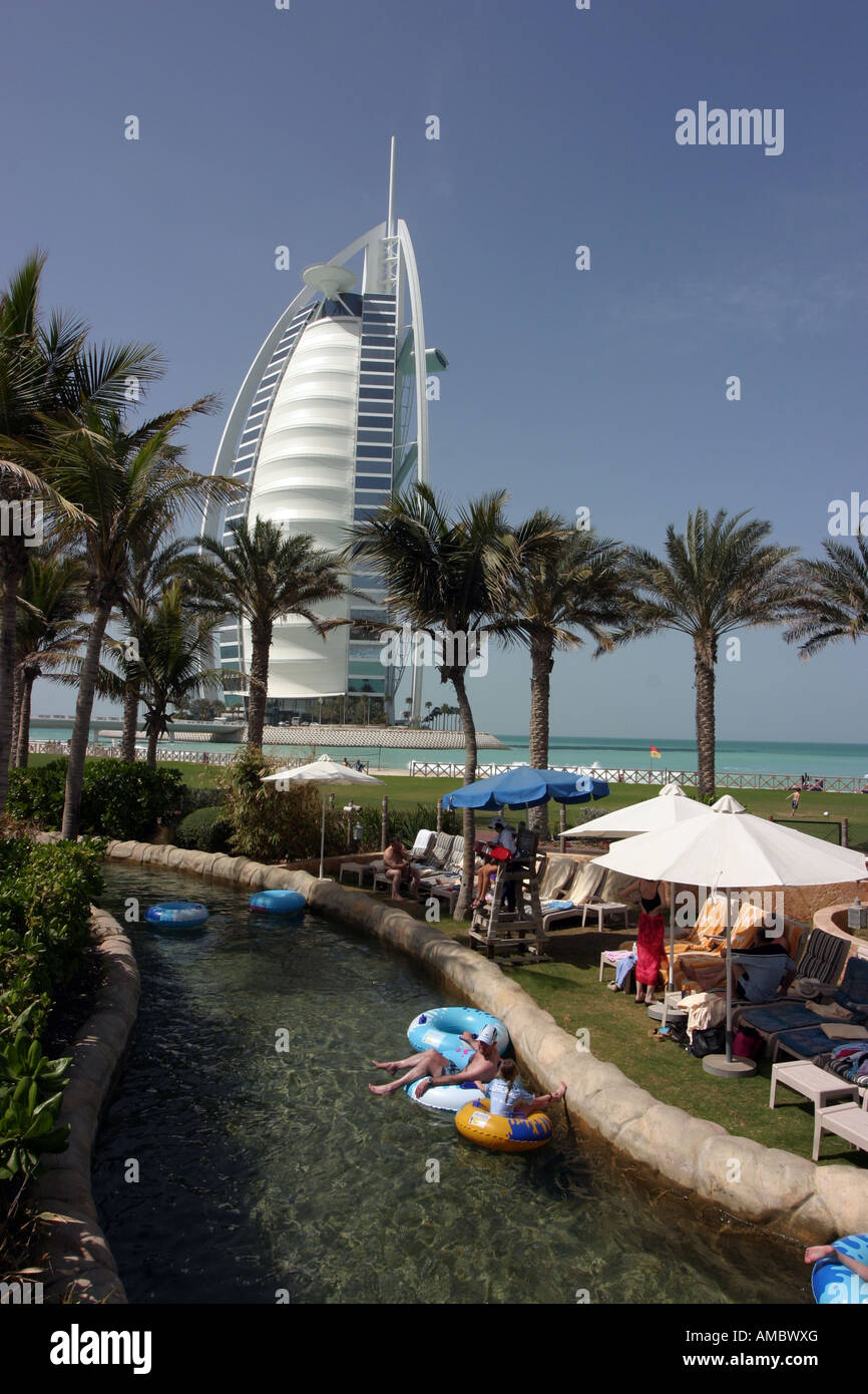 Tourists in the water park in front of the Burj hotel Stock Photo