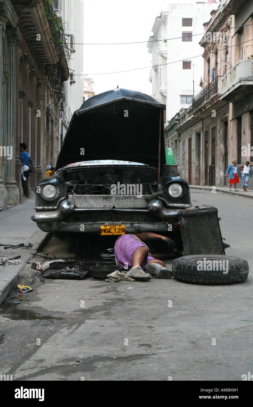Cuba Havana an automechanic in the street Stock Photo
