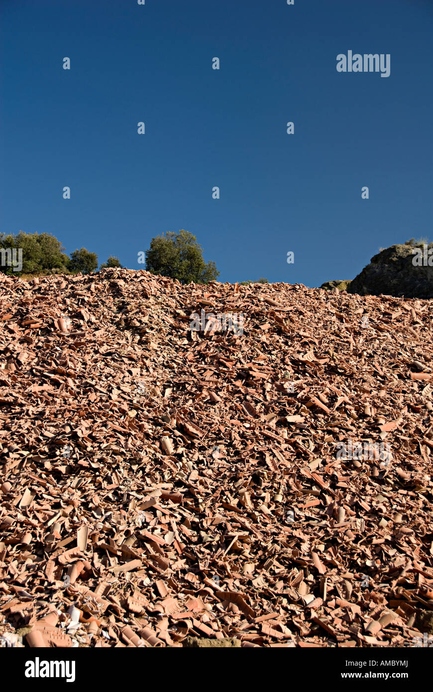 recycling of old roof tiles in france near limoux with large piles of