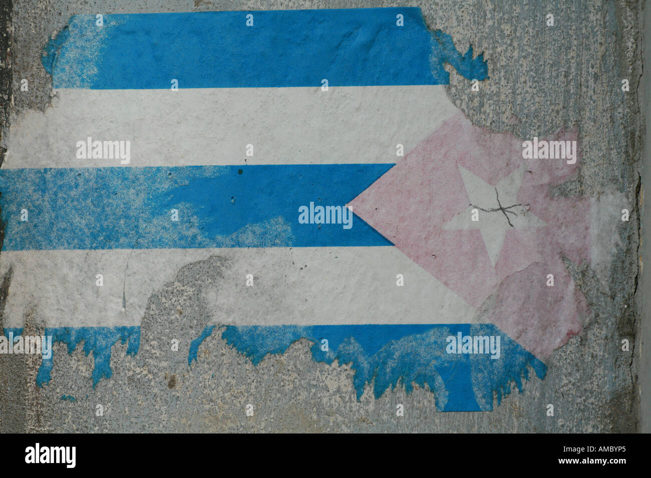 Havana Cuba a rotten decayed cuban flag on a wall Stock Photo