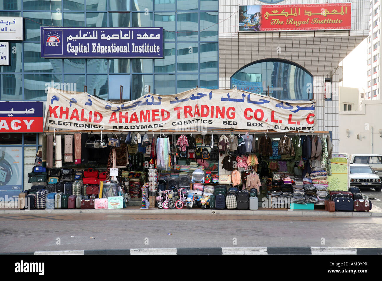 General store against modern buildings, Abu Dhabi city, UAE Stock Photo
