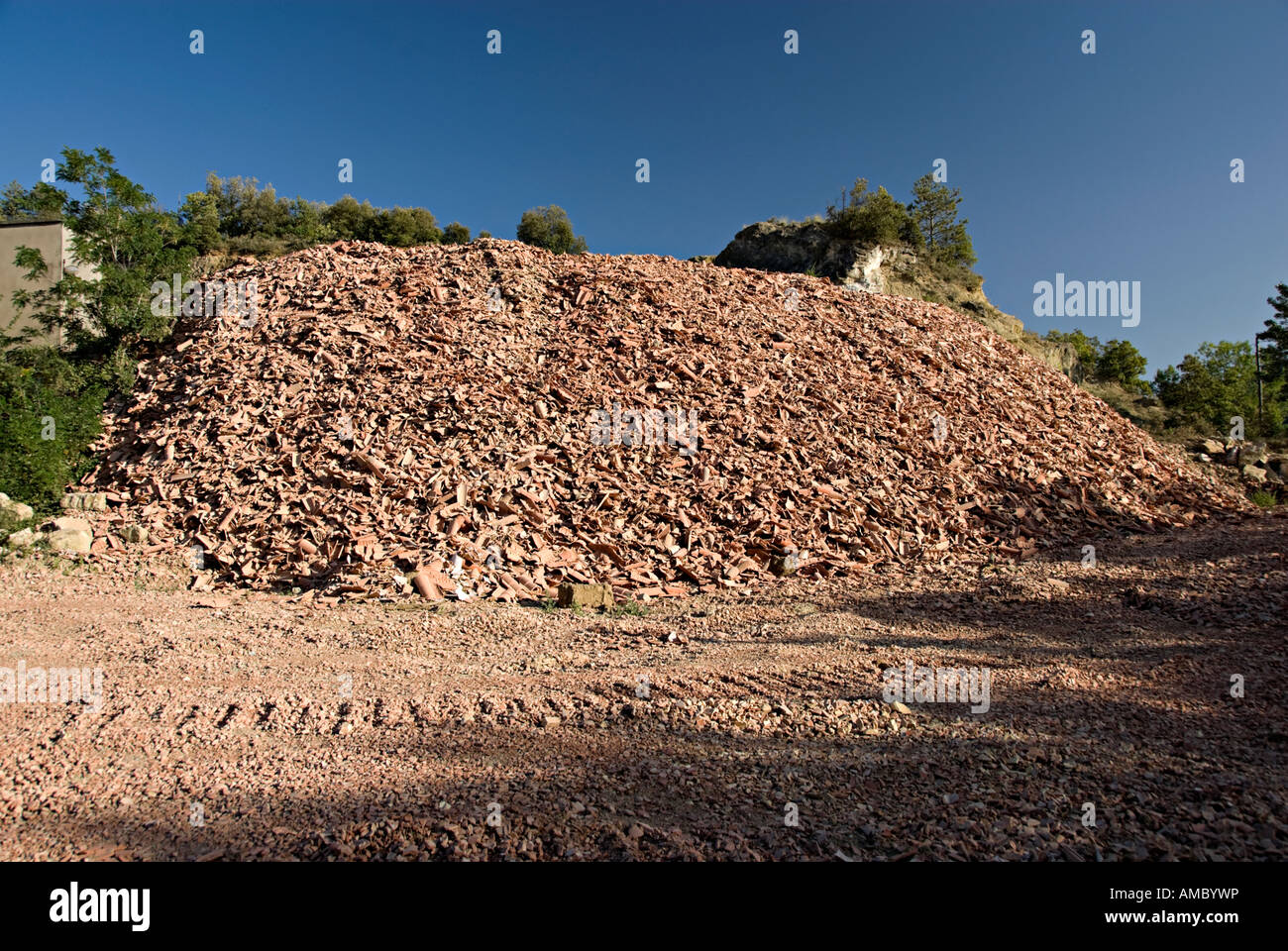 recycling of old roof tiles in france near limoux with large piles of