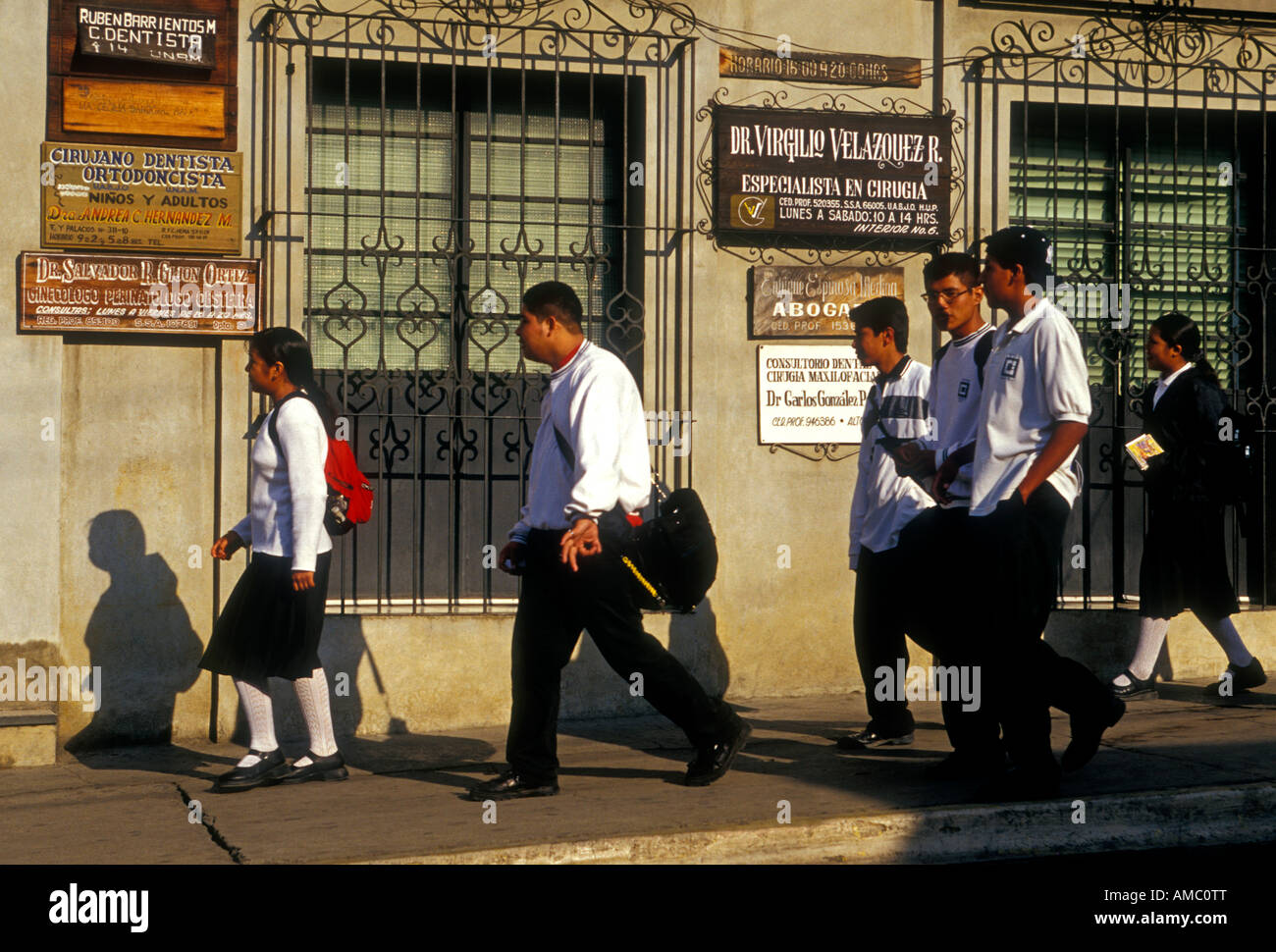 Mexicans, Mexican people, Mexican students, students, walking to school, capital city, Oaxaca de Juarez, Oaxaca, Oaxaca State, Mexico Stock Photo