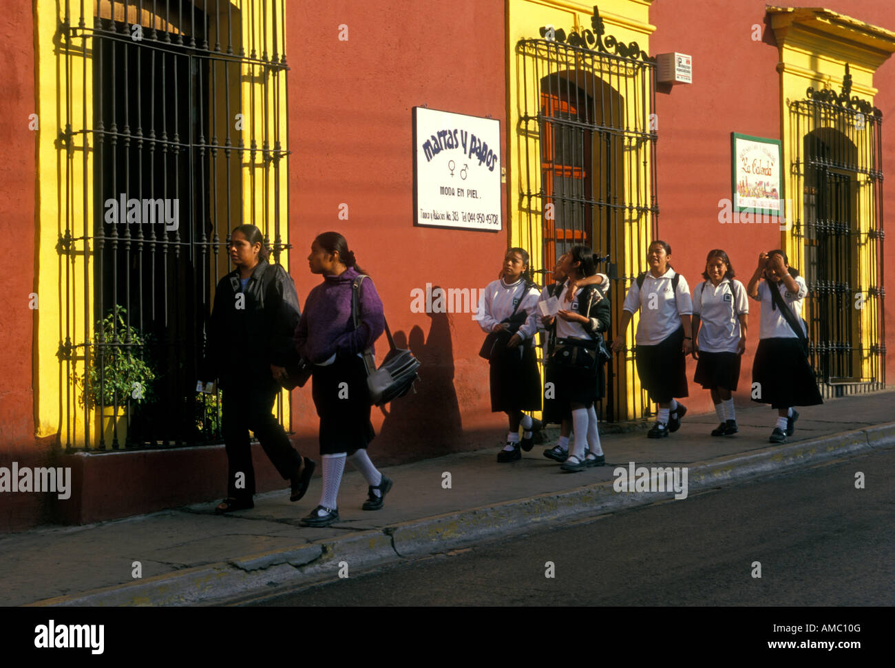 Mexicans, Mexican girls, girls, Mexican students, students, students walking to school, Oaxaca, Oaxaca de Juarez, Oaxaca State, Mexico Stock Photo