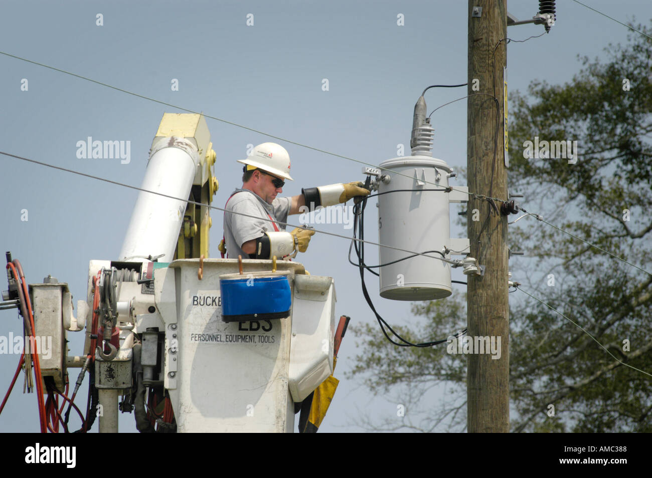 Electric Company Linemen Working on real Power Transmission Lines in