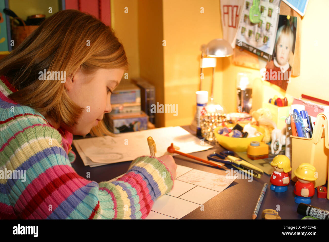 Young Girl Aged 9 10 11 Years Old Doing Her School Homework On A