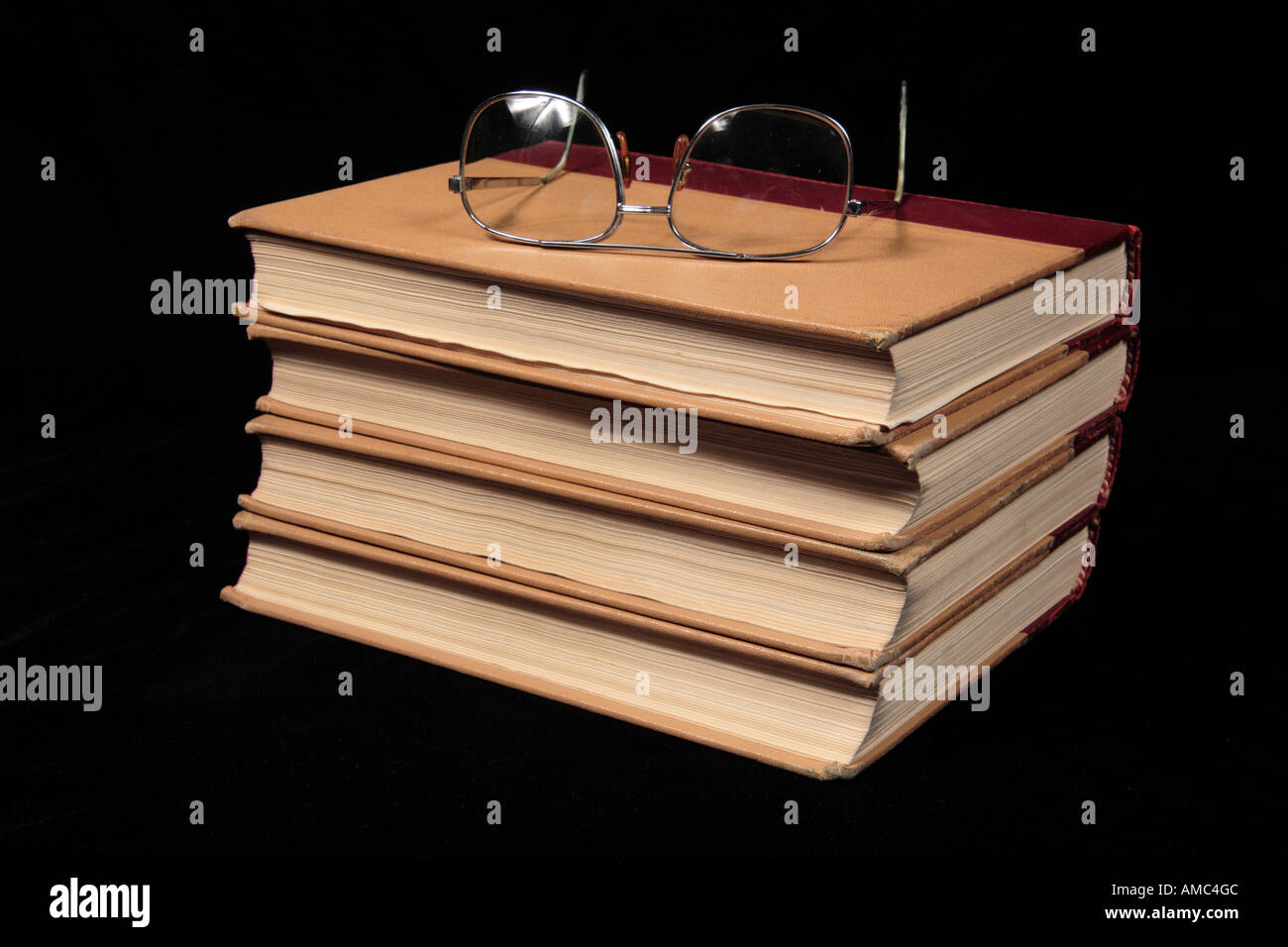 Books and spec's reading knowledge Stock Photo - Alamy