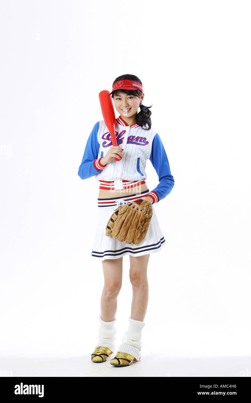 Charming woman in baseball Stock Photo Alamy