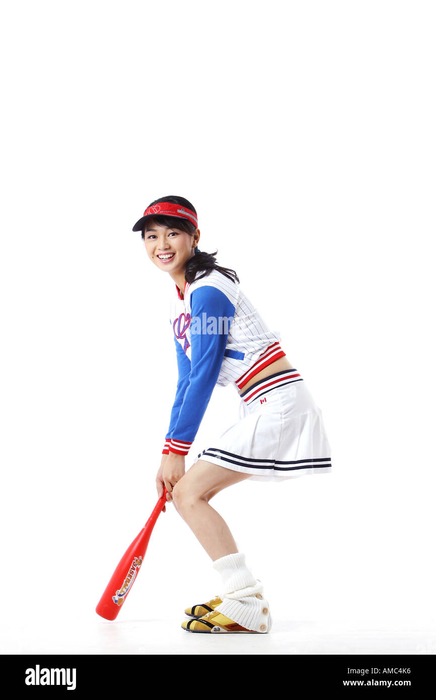 Charming woman in baseball Stock Photo Alamy