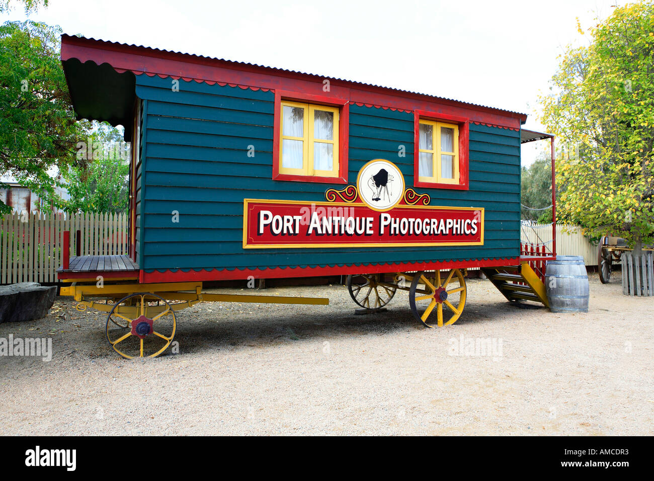 Port antique photographics, red and blue wagon on yellow wheels, Murray Esplanade, Echuca, Victoria, Australia Stock Photo