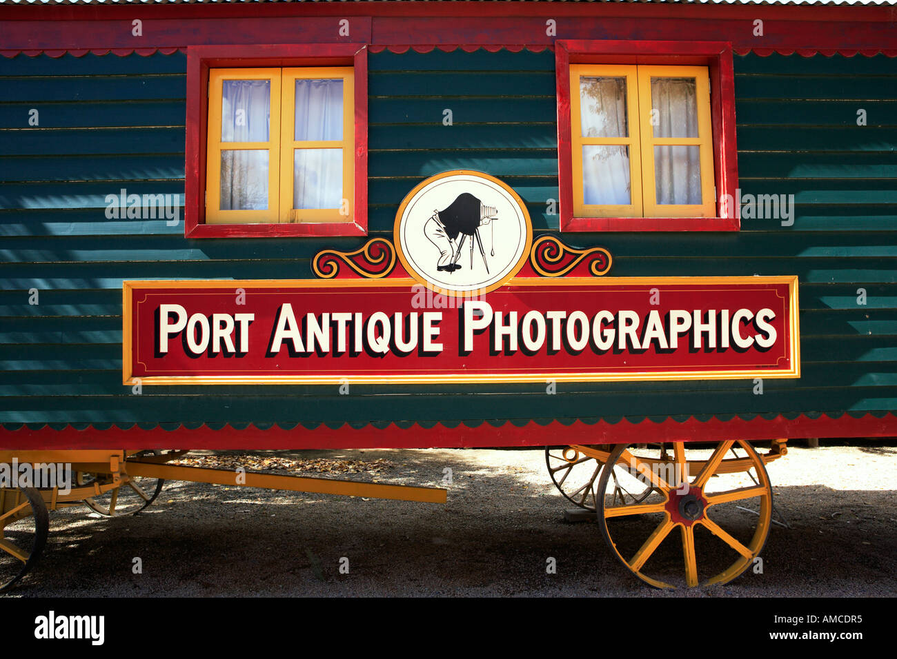 Port antique photographics red and blue wagon on yellow wheel Murray Esplanade Echuca Victoria Australia Stock Photo