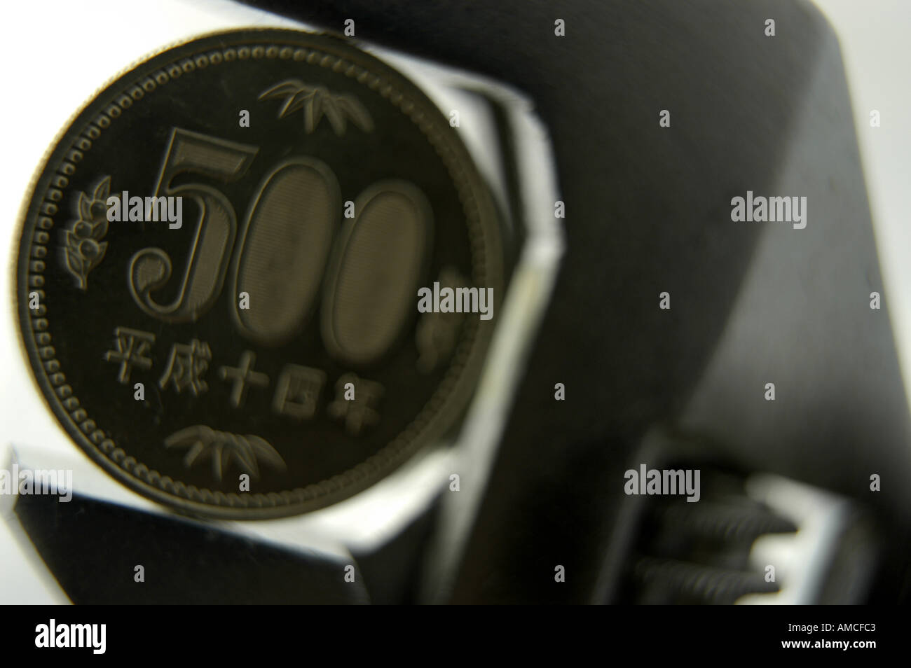 500 five hundred yen coin in measuring tool horizontal Stock Photo