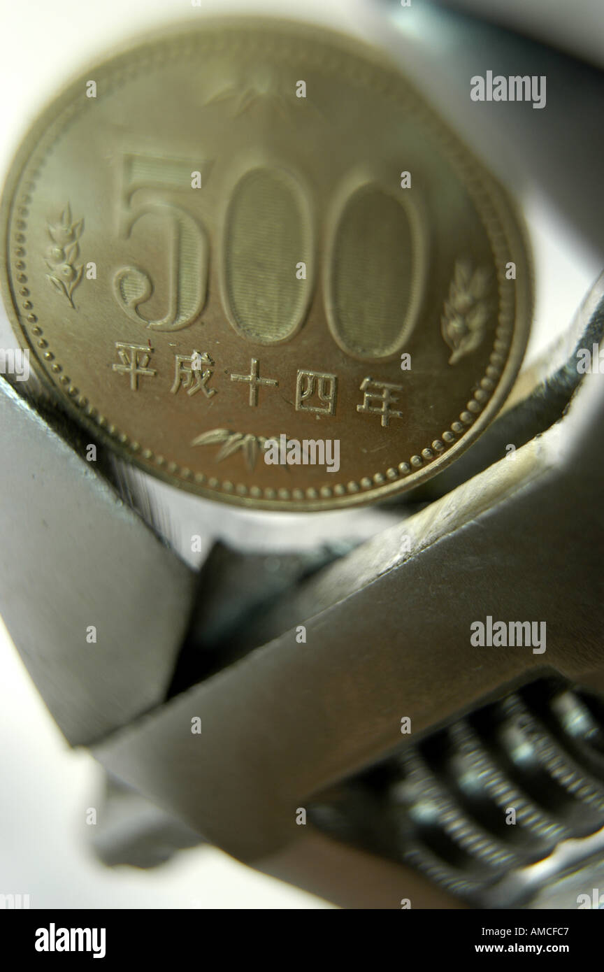 500 five hundred yen coin in measuring tool vertical Stock Photo