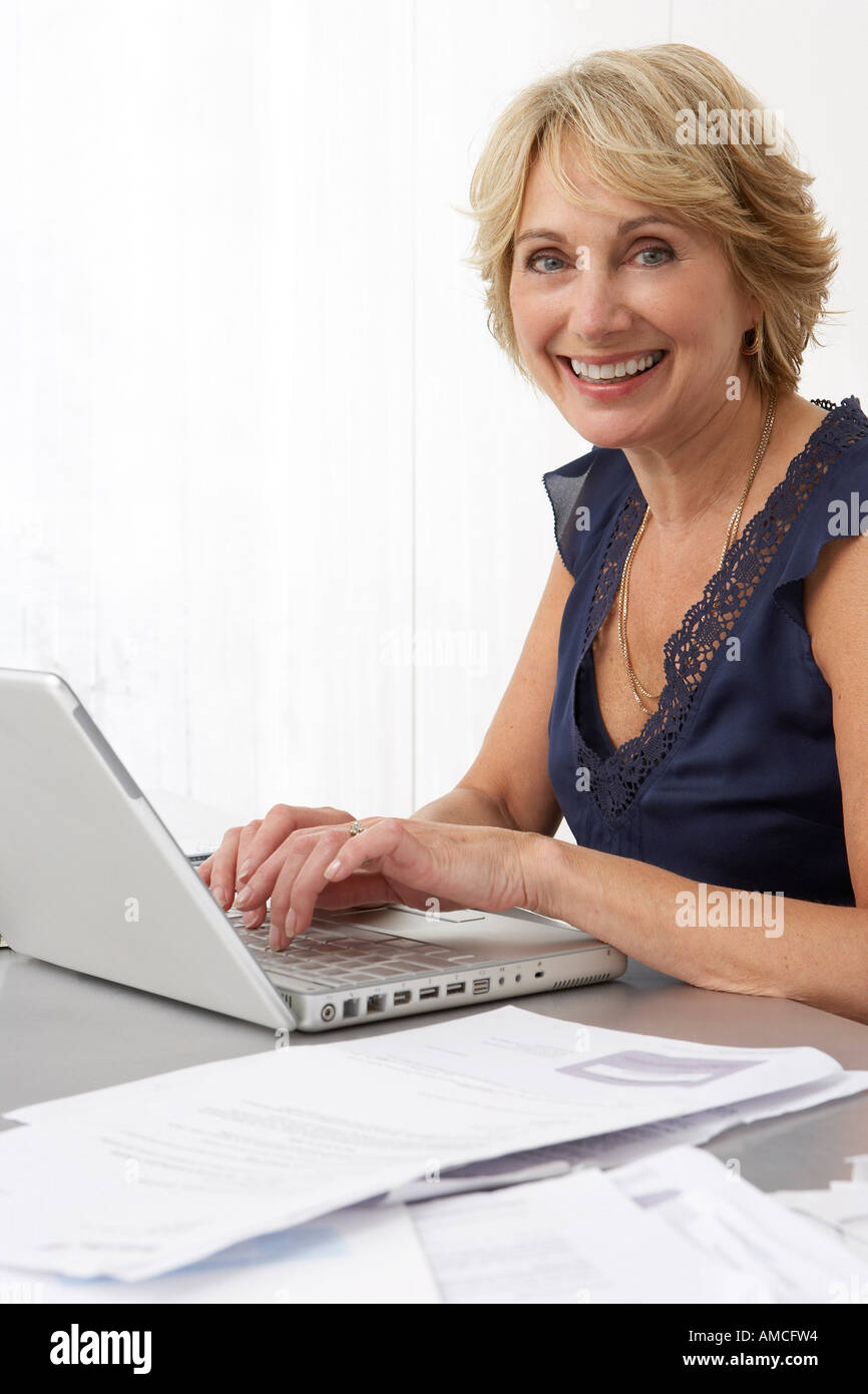 Woman Using Laptop Stock Photo