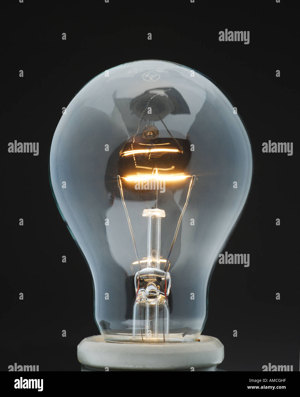 Glowing Tungsten Filament in Electric Light Bulb Stock Photo - Alamy