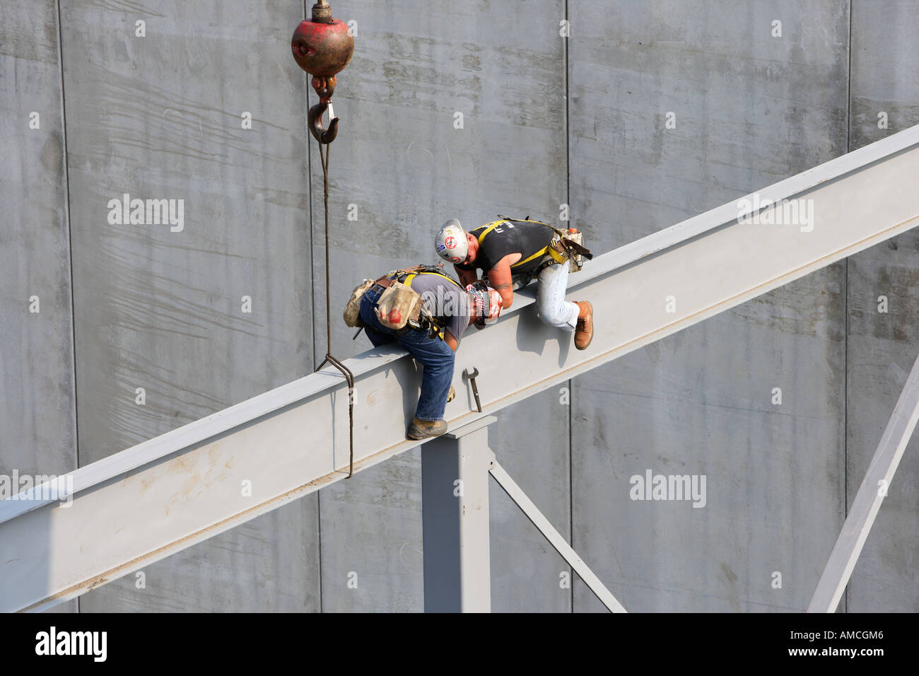 Steel Workers on I Beam Stock Photo