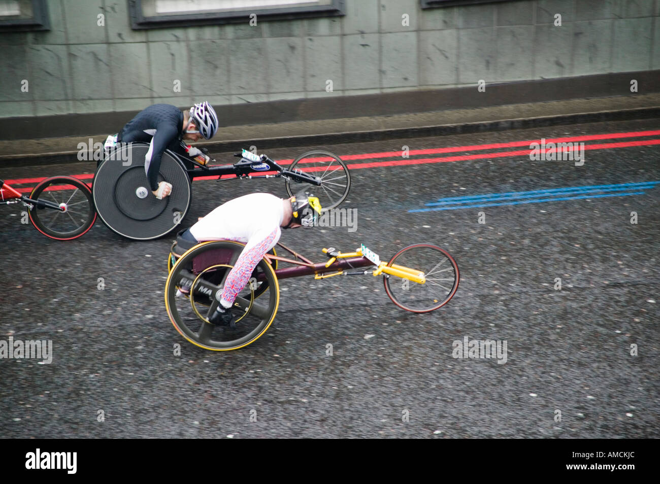 wheelchair athletes competing in the london marathon, UK Stock Photo