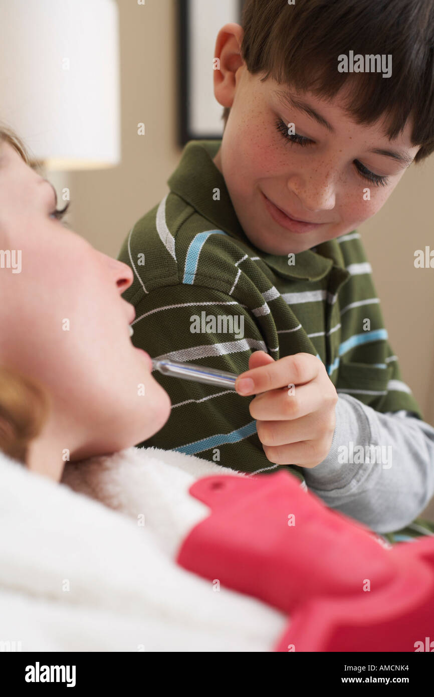 Little boy helping an old lady hires stock photography and images Alamy