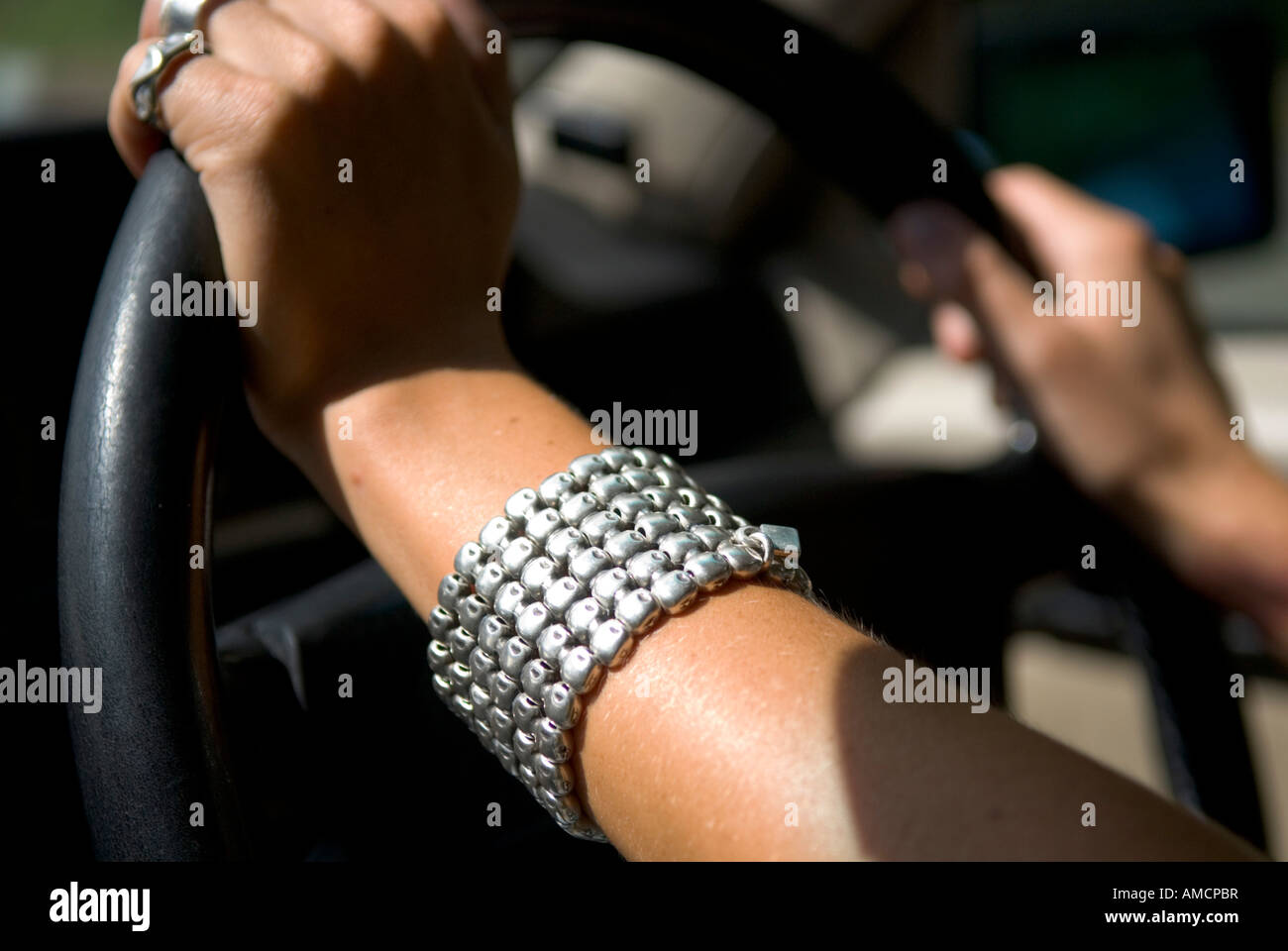 Female hands on steering wheel hi-res stock photography and images - Alamy