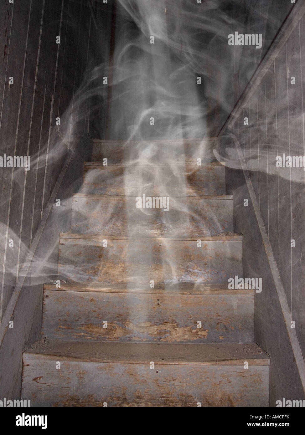 Ghost descending stairs Stock Photo