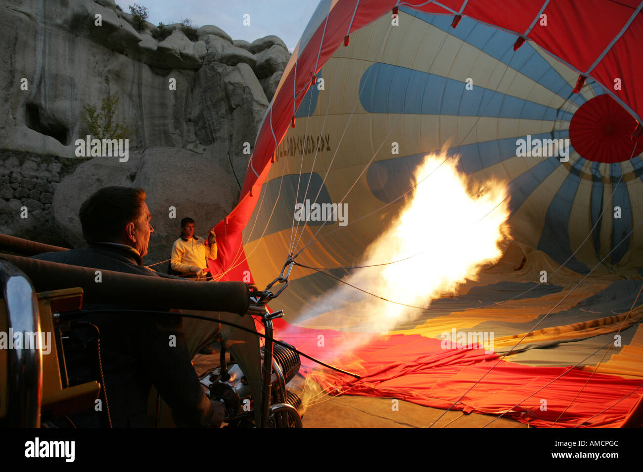 TUR, Turkey, Cappadocia, Hot Air Ballooning over Cappadocia. Balloons of Kapadokya Balloons. Pre-launching procedure Stock Photo