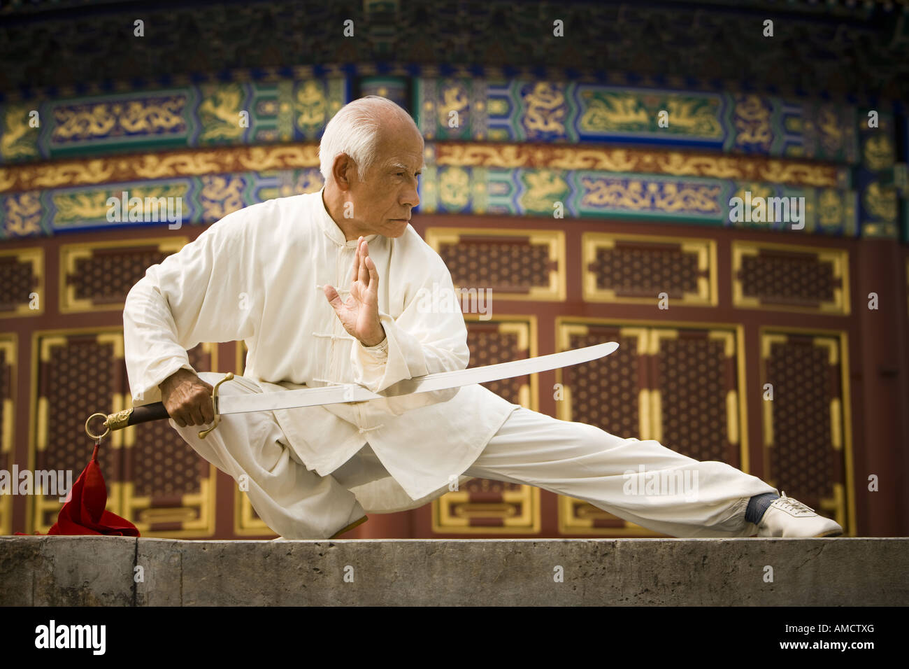 Man with sword doing Kung Fu Stock Photo - Alamy Man with sword doing Kung Fu Stock Photo - Alamy