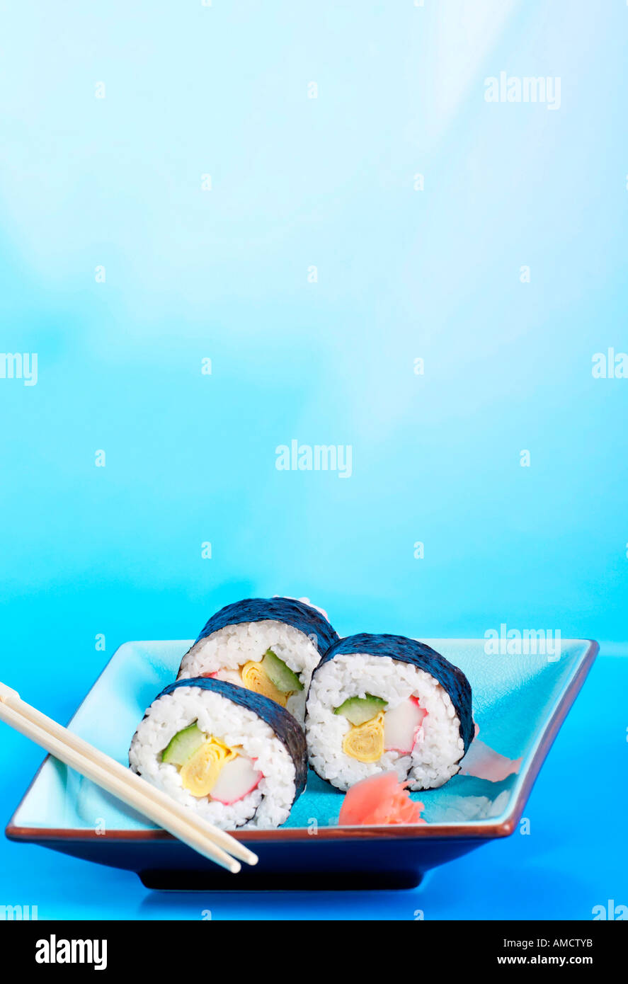 Plate of sushi with ginger and chopsticks Stock Photo