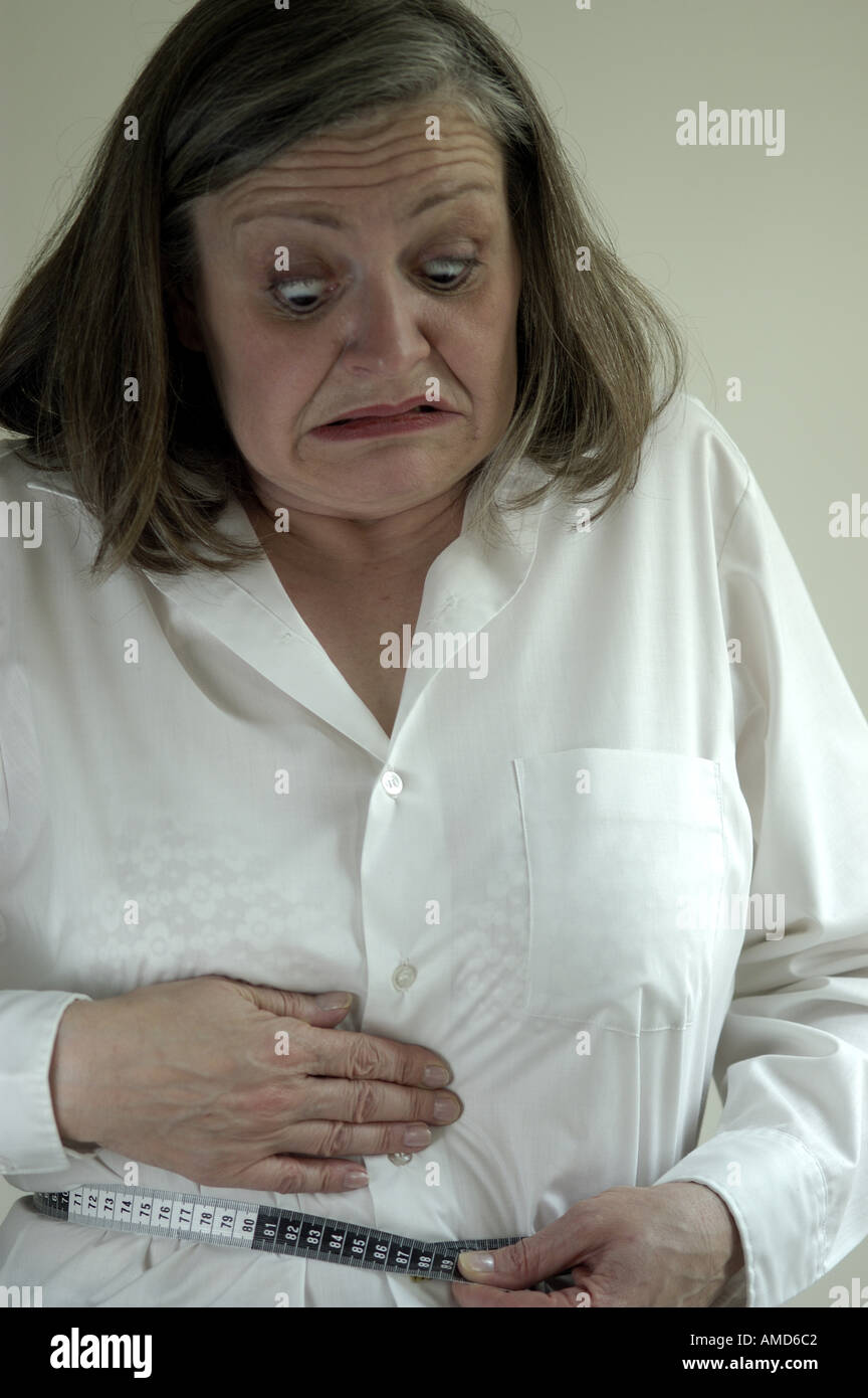 older Woman feeling she is getting fat Menopause age happy happiness