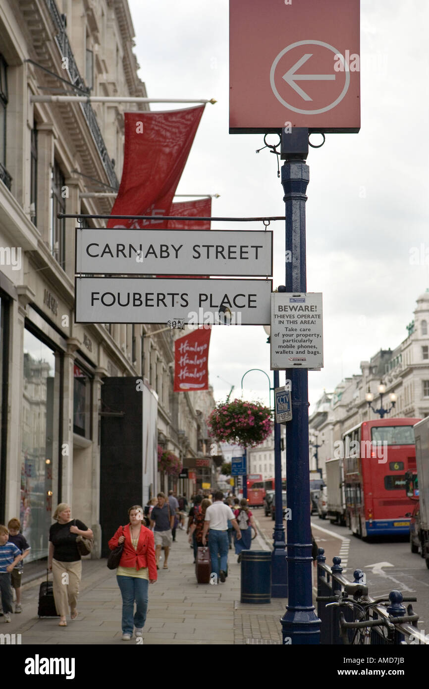 Street sign for Carnaby Street on Regent Street in the West End of London Stock Photo