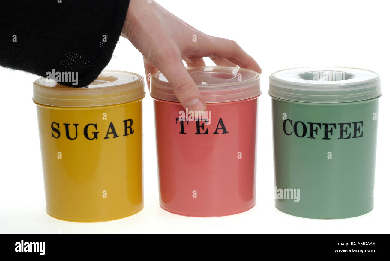 colourful plastic boxes for sugar, tea and coffee Stock Photo