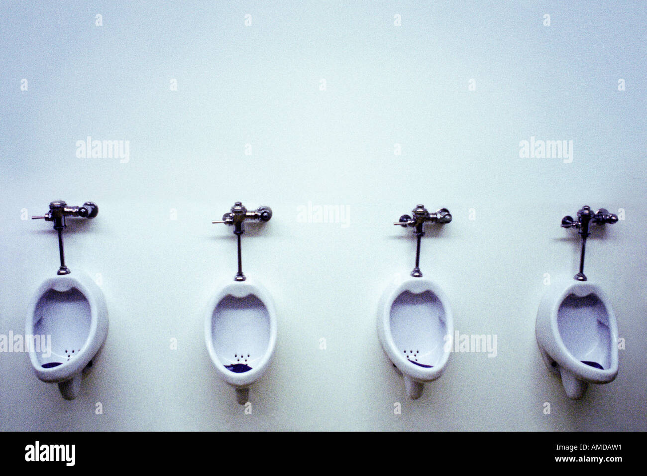 Row of Urinals in Bathroom Stock Photo