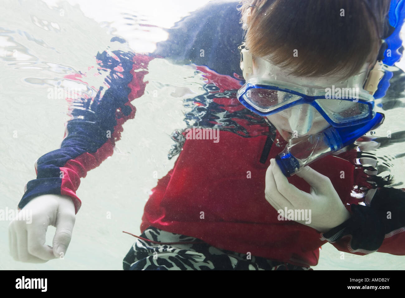 Boy underwater with goggles and snorkel Stock Photo Alamy