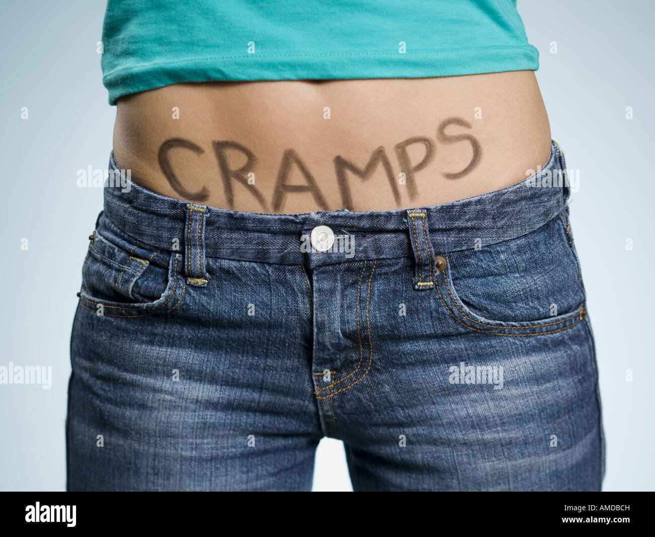 Female Abdomen with CRAMPS written on it Stock Photo Alamy