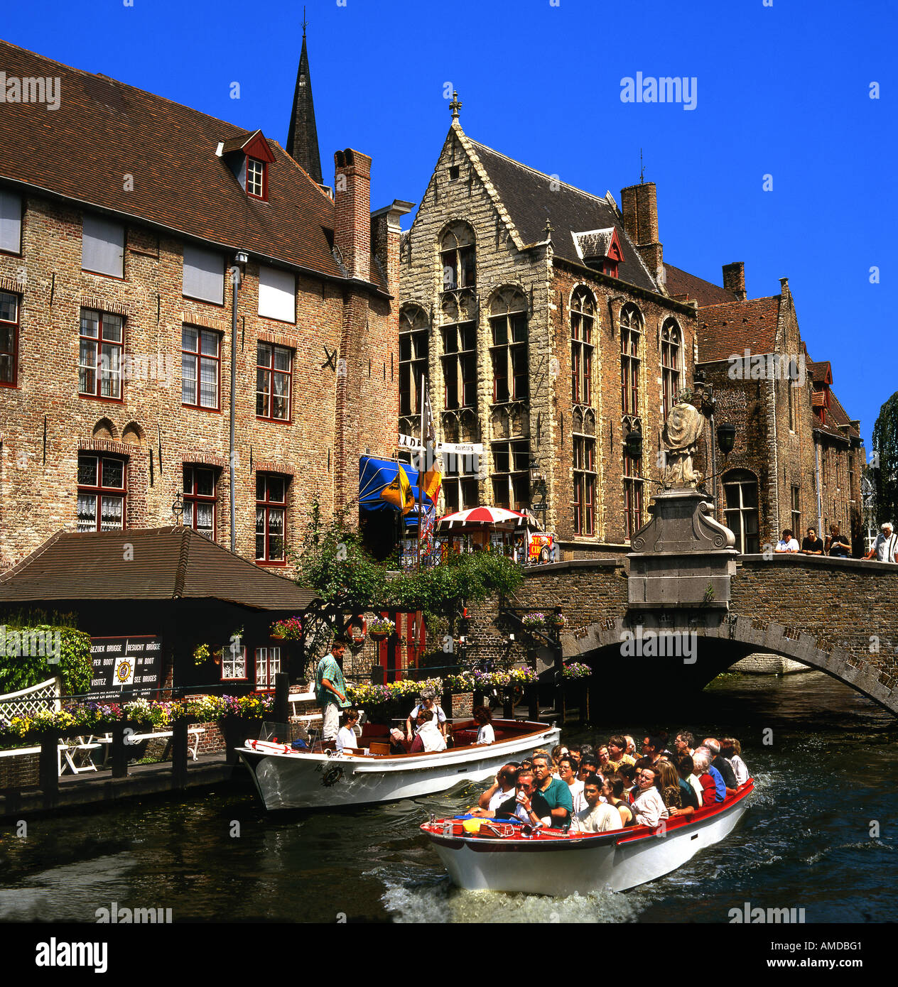 Tourist Boats on a Bruges Canal. Stock Photo