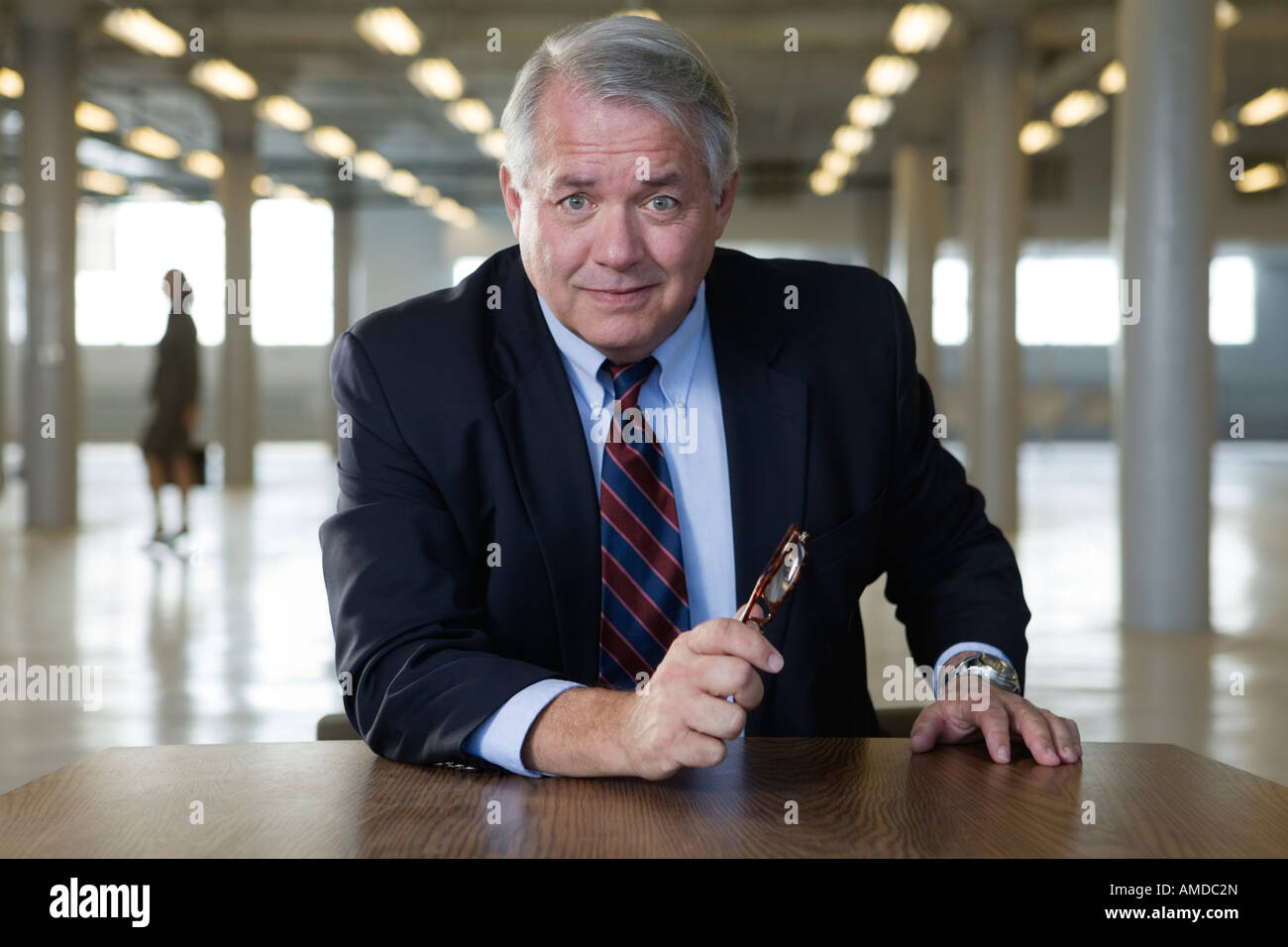 Portrait of a businessman smiling Stock Photo - Alamy