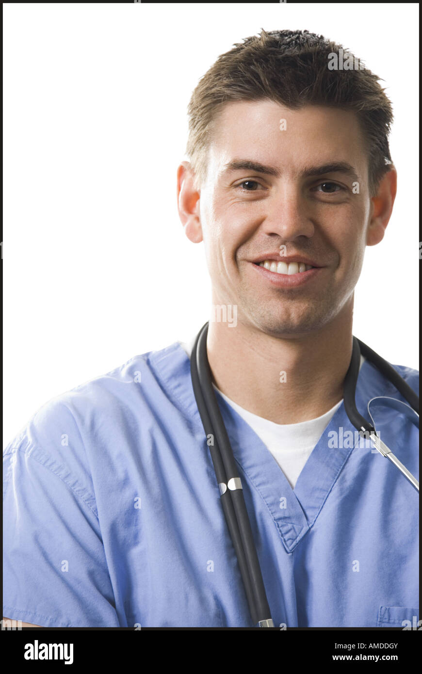 Portrait of a male medical practitioner with stethoscope smiling Stock Photo