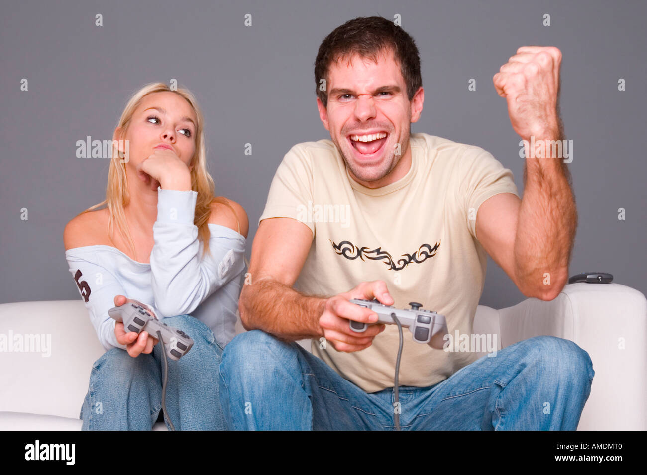 Young couple playing video game Stock Photo