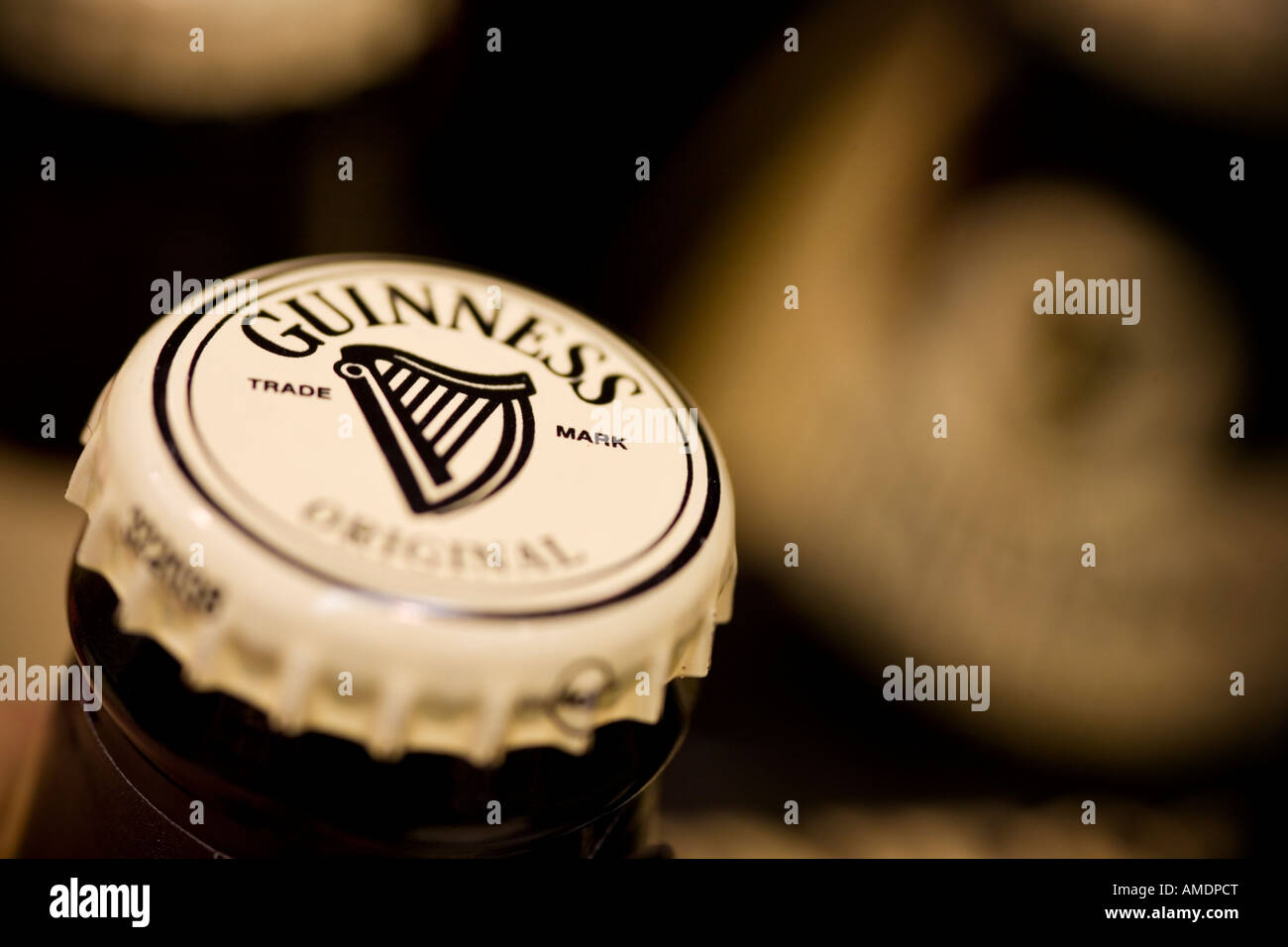 Guinness bottle top Guinness is a Diageo brand Stock Photo
