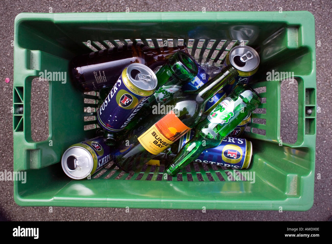 A household recycle glass and can basket provided by the local council