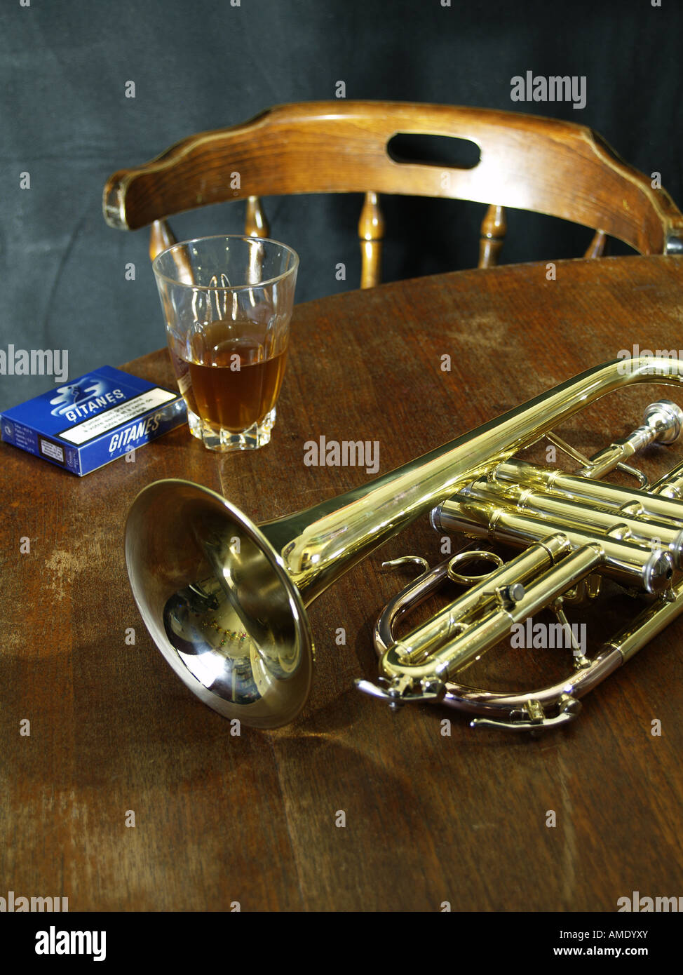 trumpet, cigarettes and a drink Stock Photo Alamy