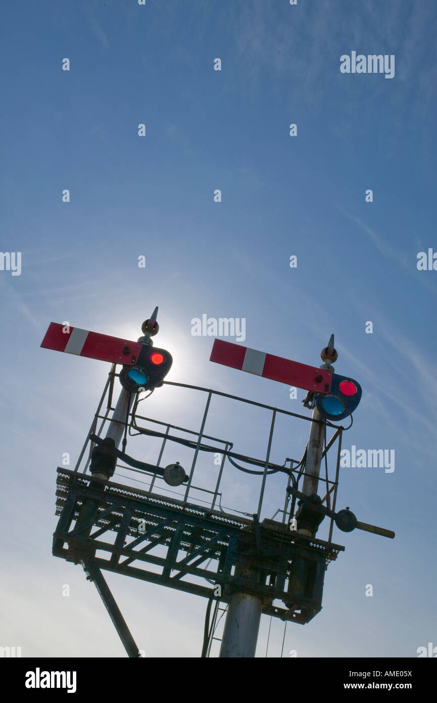 TWO RAILWAY SIGNALS ON GANTRY Stock Photo