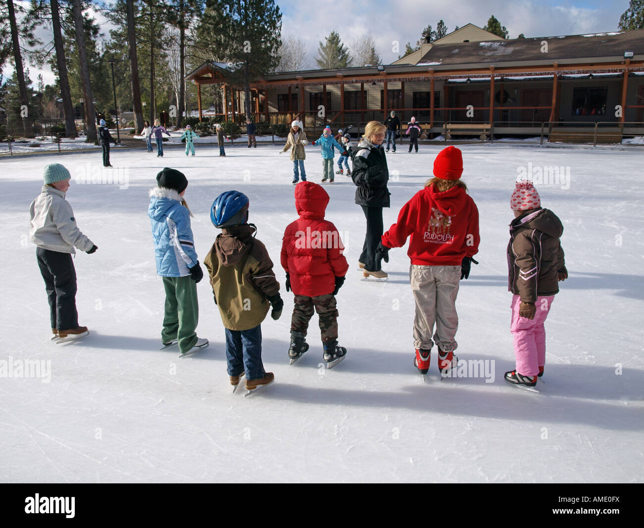 USA OREGON BEND A group of young children take their first ice skating