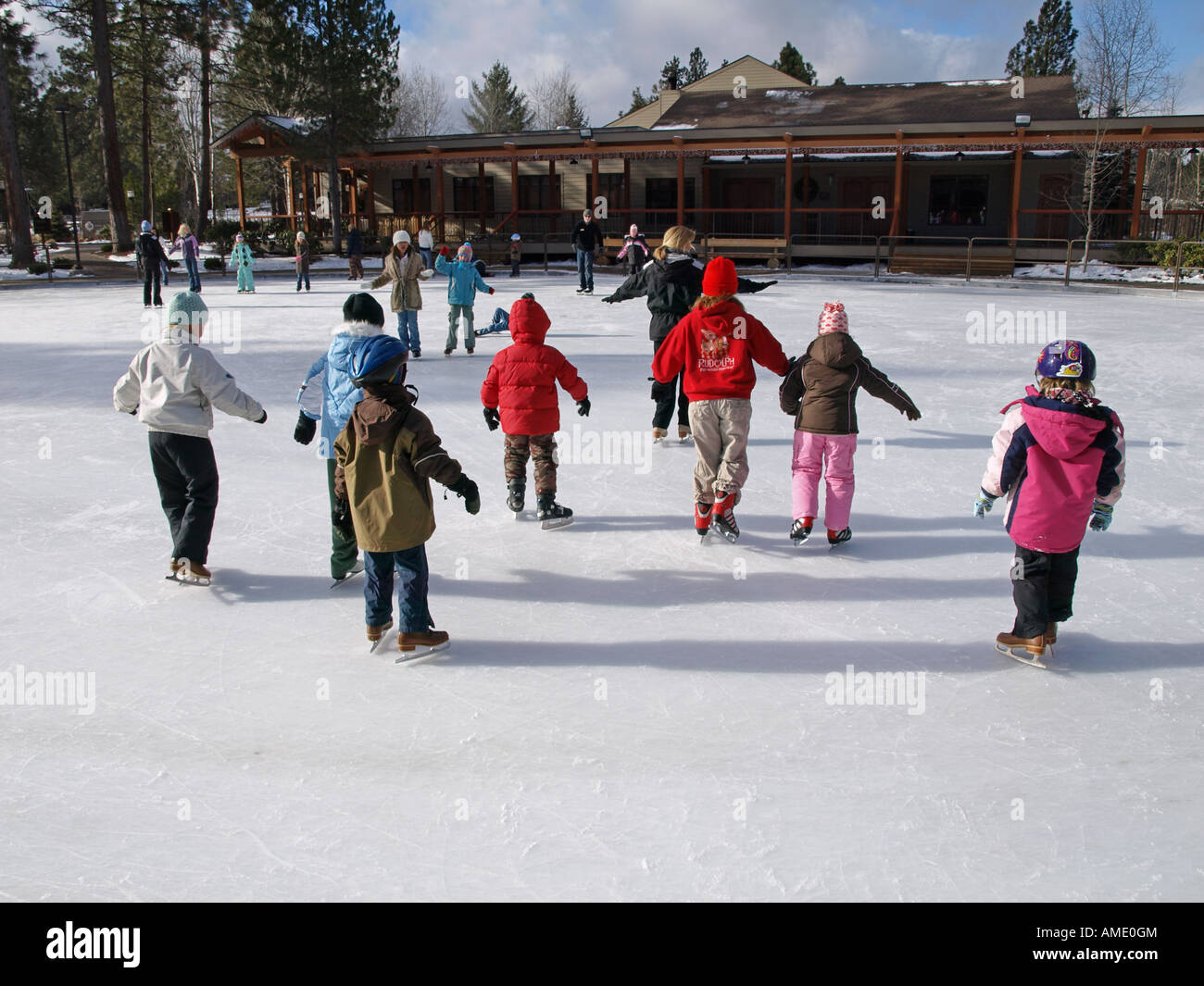 USA OREGON BEND A group of young children take their first ice skating